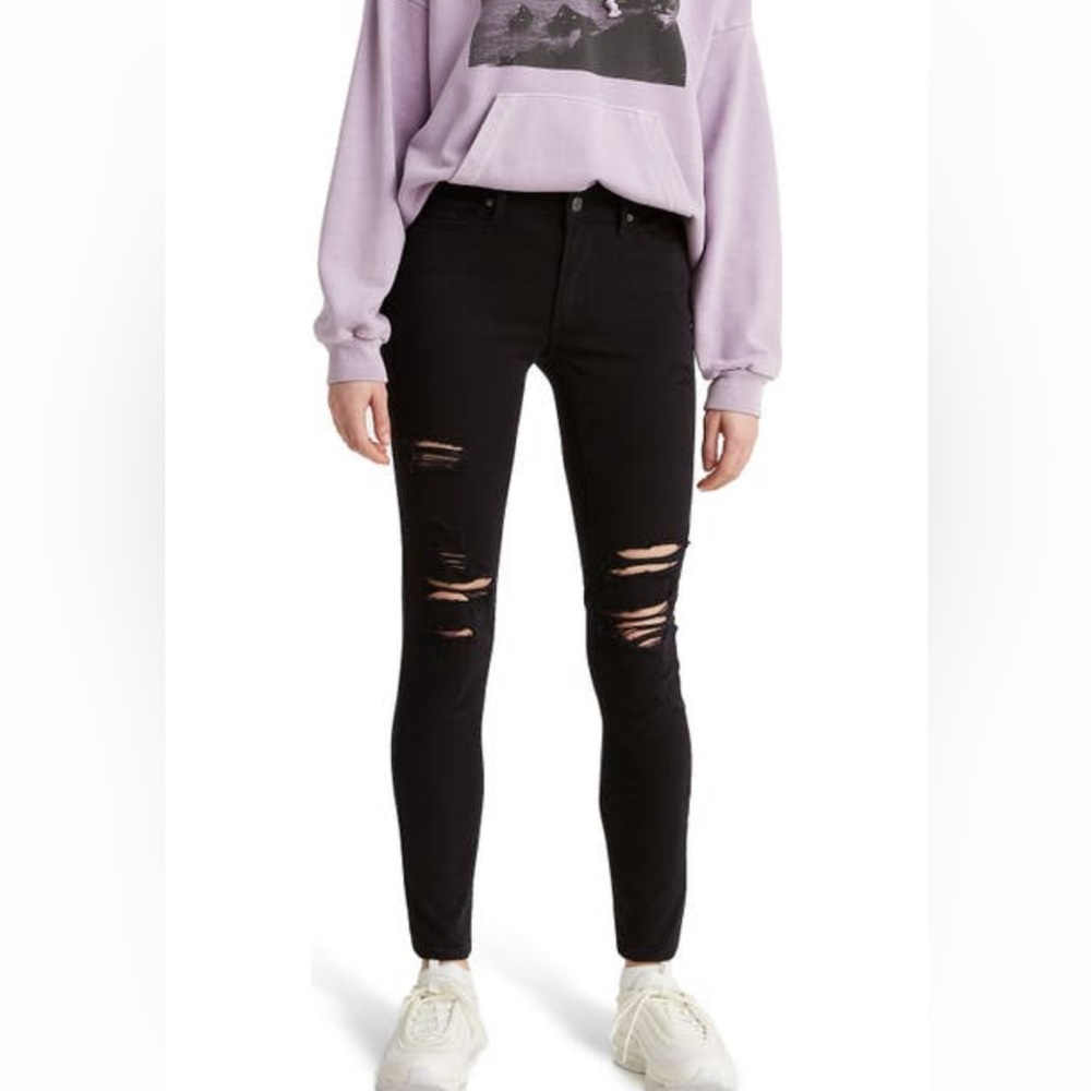 Levi’s 711 distressed skinny jeans black